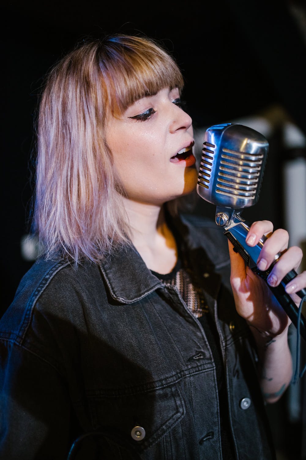 Woman with microphone singing