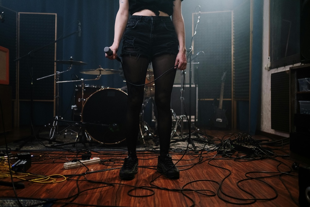 Woman holding microphone Woman holding microphone